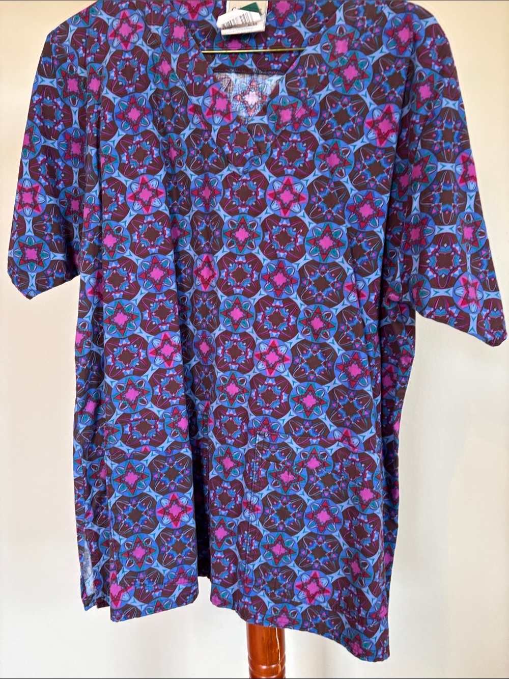Vibrant Cottonality ladies scrub top in Purple & Blue
Size Medium